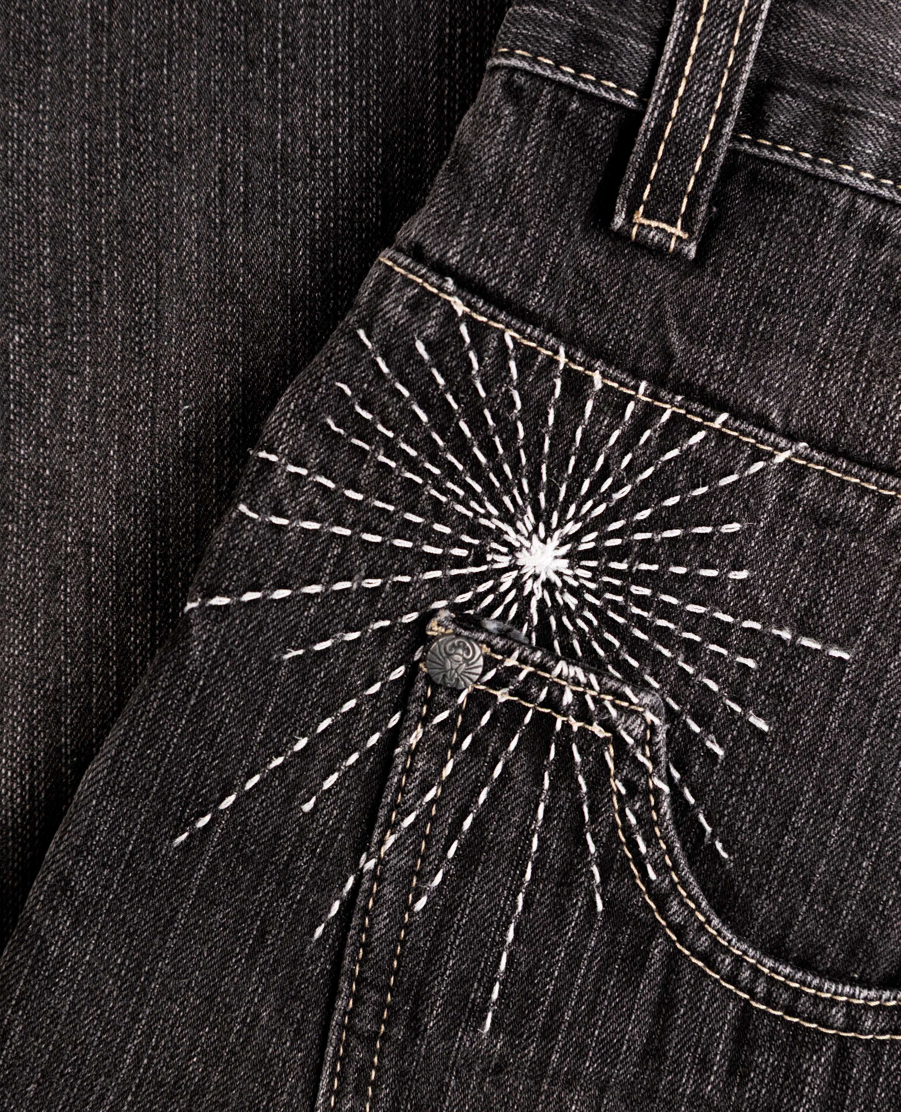 BLACK WILDLIFE LOOSE-FIT DENIM