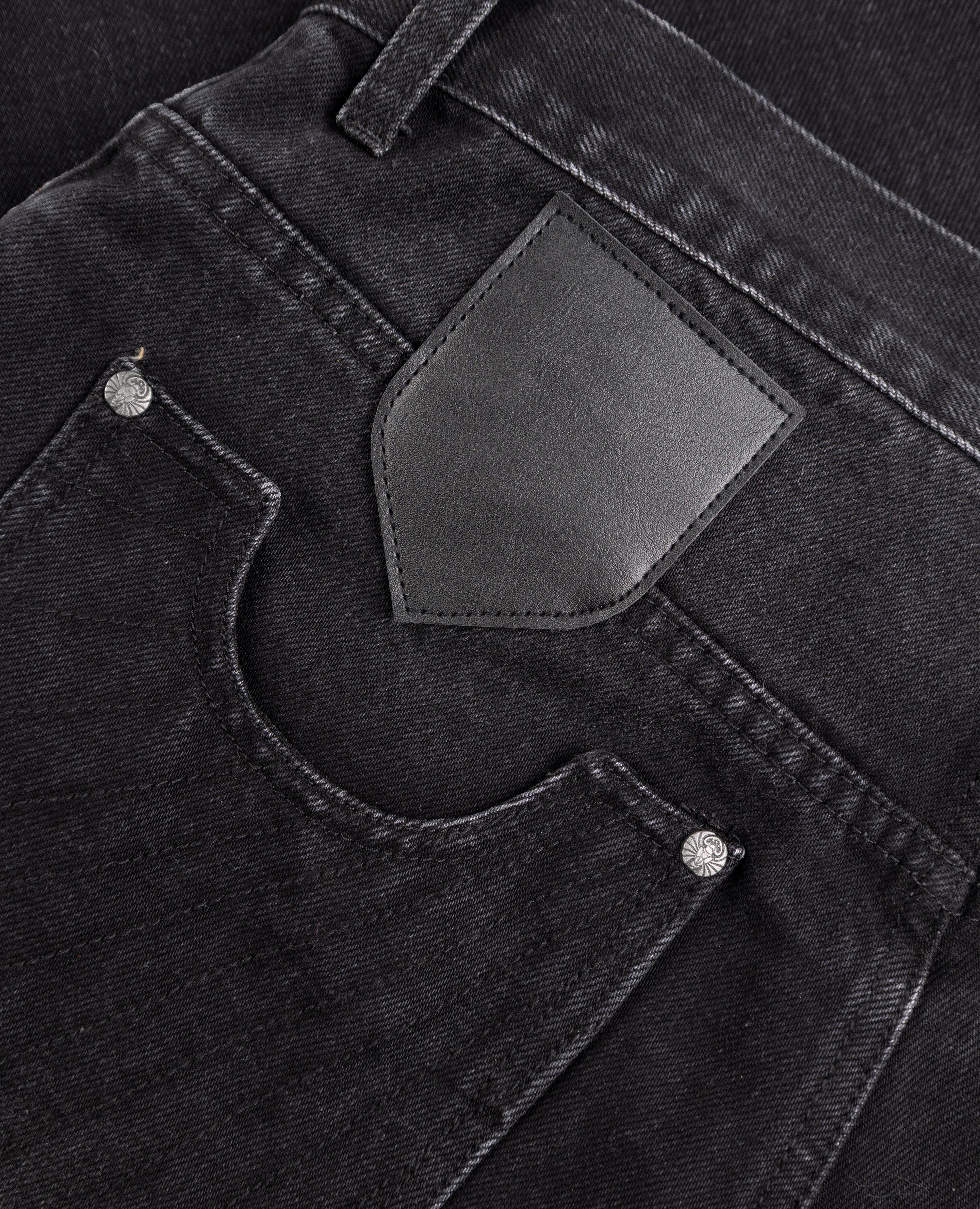 ULTRA-LOOSE BLACK BADGES DENIM